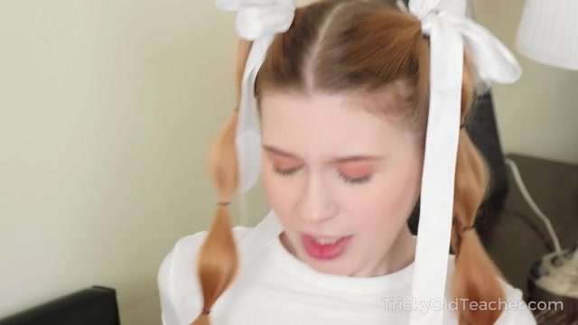 Sweetie kneels to suck her teacher's big dick