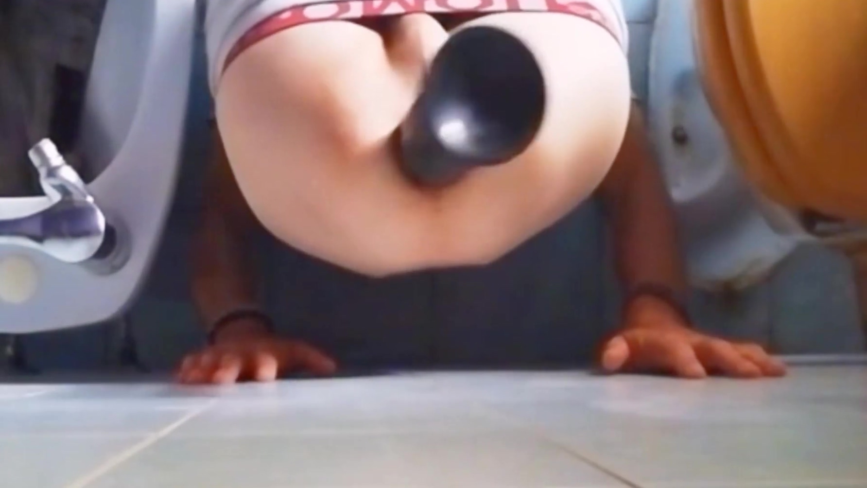 Young Man Plays With His Huge Dildo