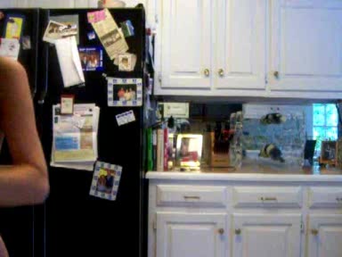 Young busty chick strips in the kitchen, where she belongs