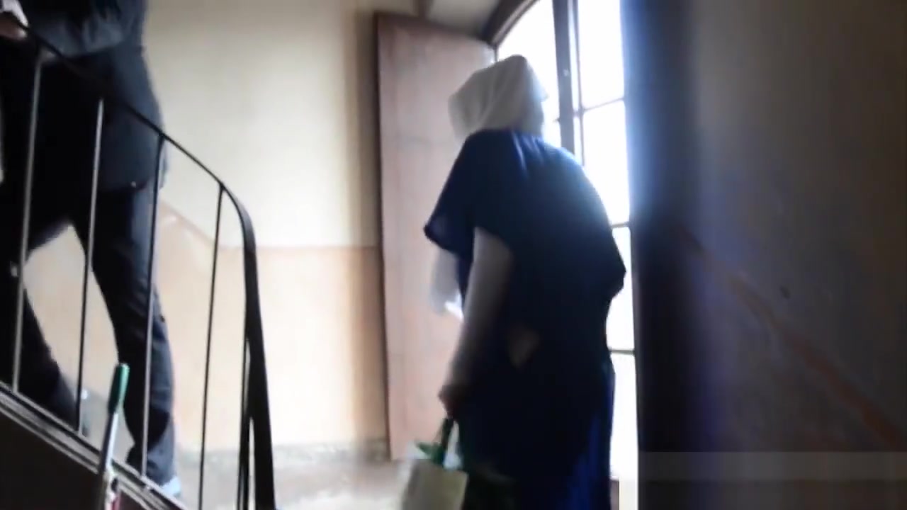 Hijab wearing babe sucking cock and balls