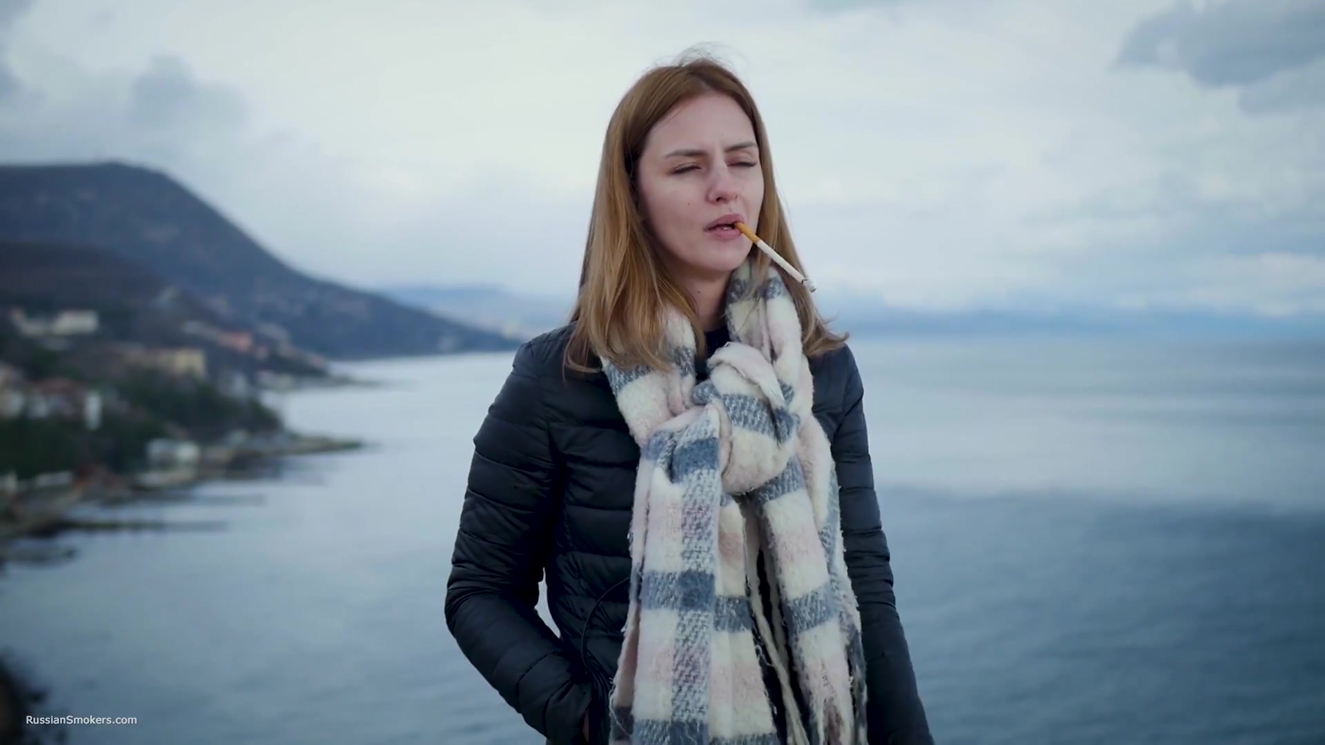 Beautiful Lady Is Smoking Two Saratoga Cigarettes In A Row On A Beautiful View