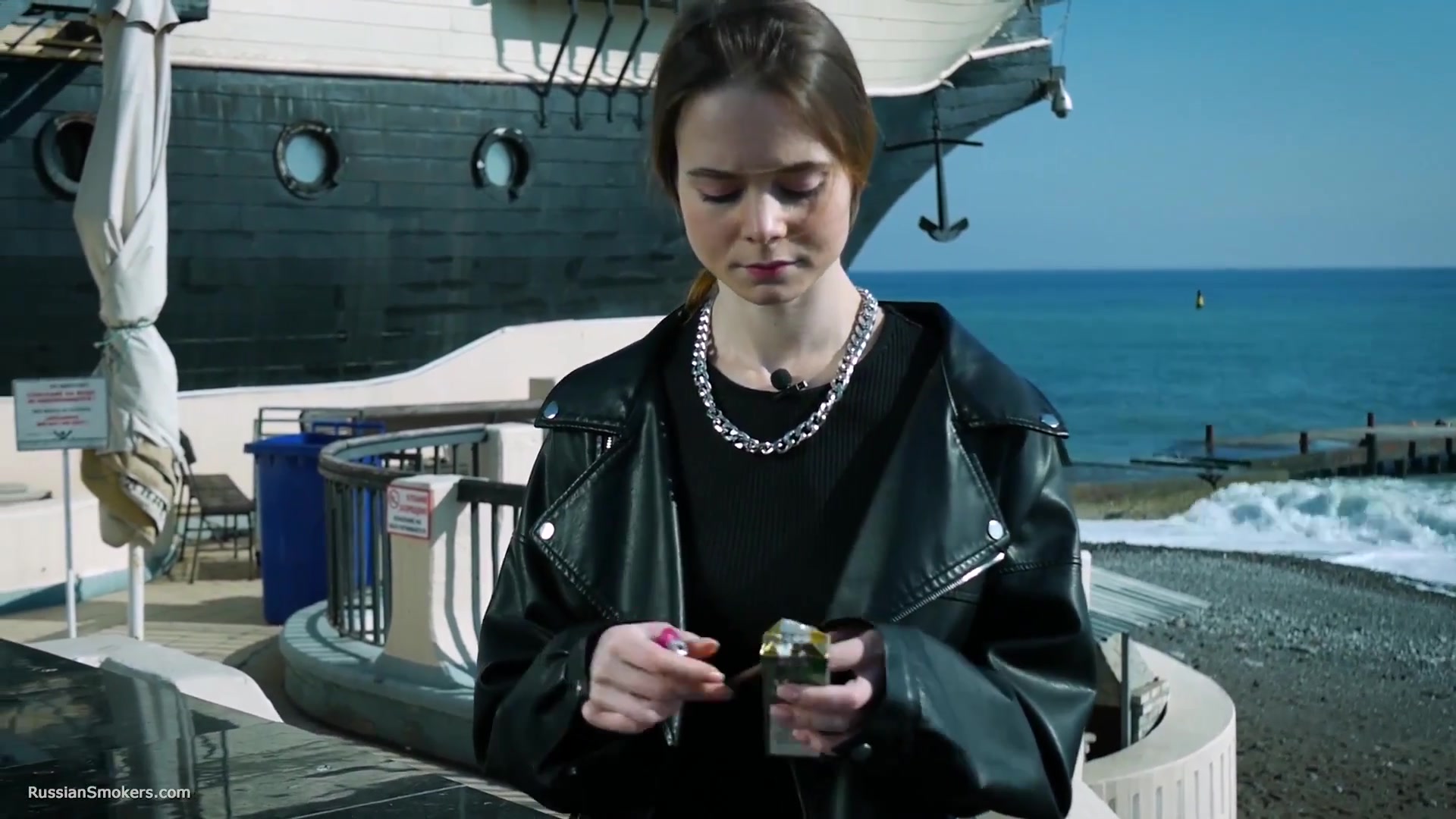 Smoking Strong Brown 120mm Cigarette Near The Beach