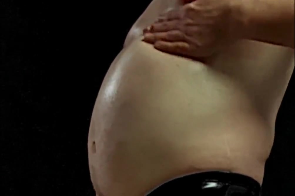 Rubbing Belly And Stroking Cock