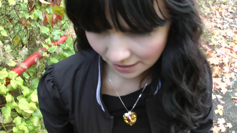 Brunette in funny panties blows cock outdoors