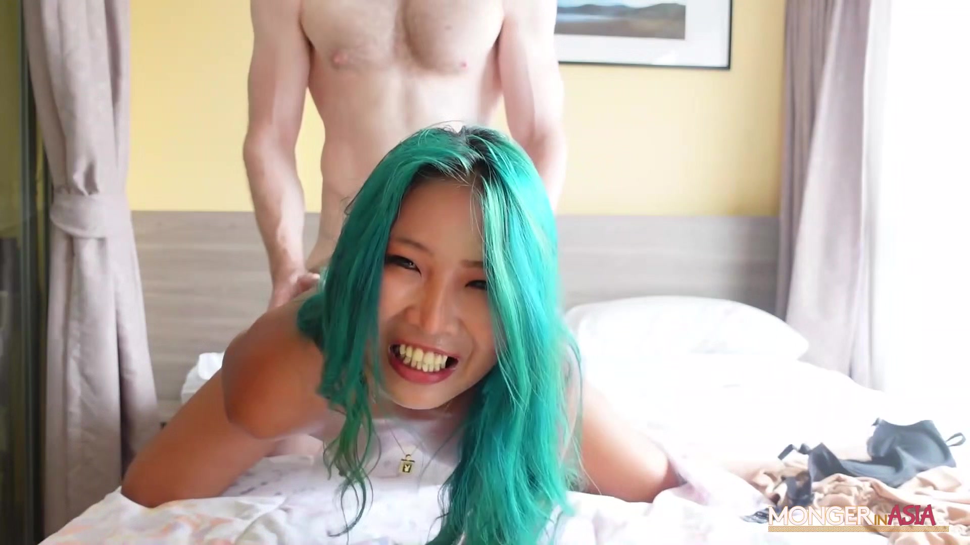 Sexy green haired Thai girl wants my cum