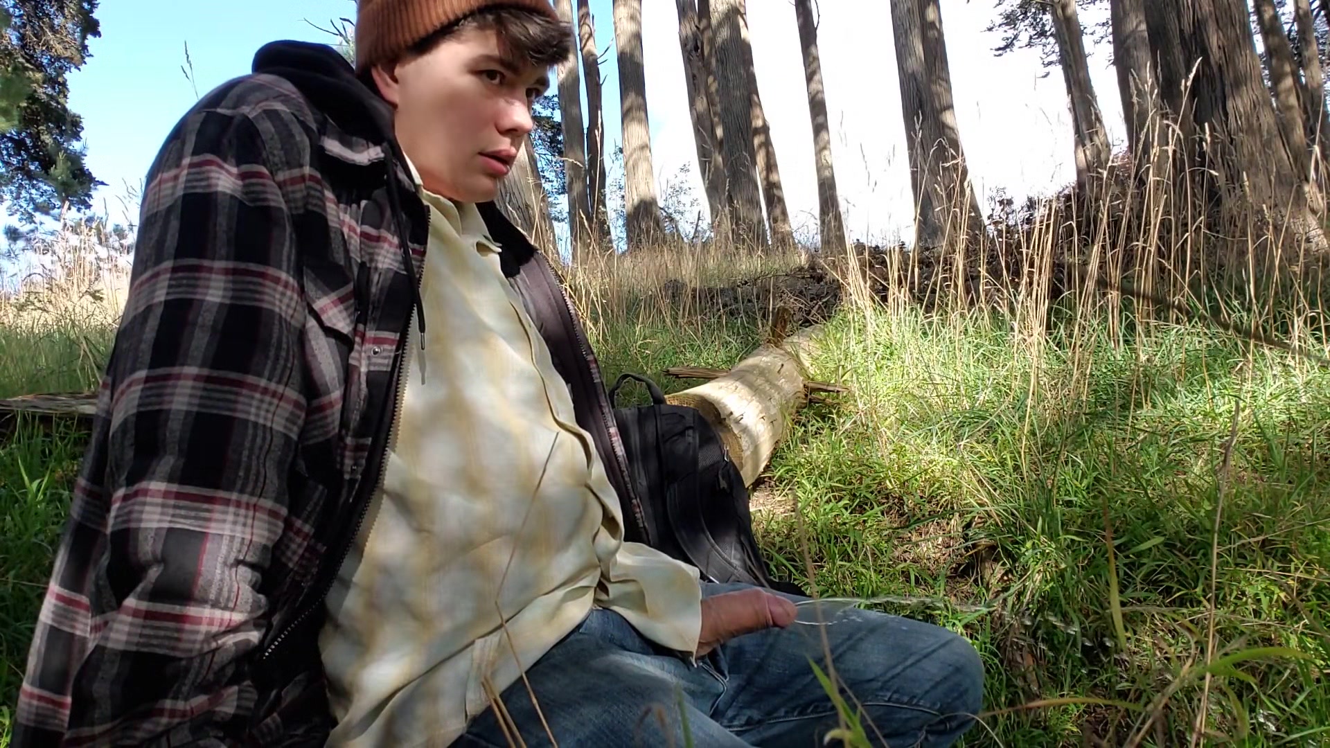 Boy stops jacking off to piss in the woods