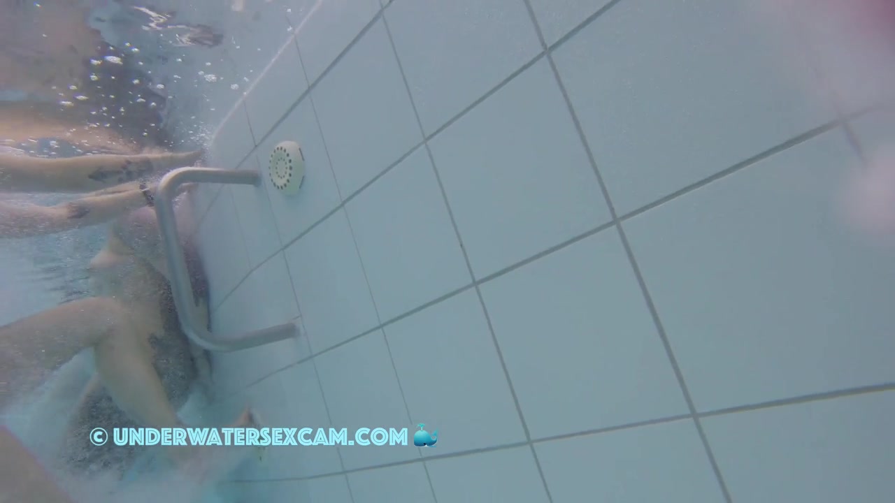 In This Underwater Video We See A Lot Of Piercings And Tattoos