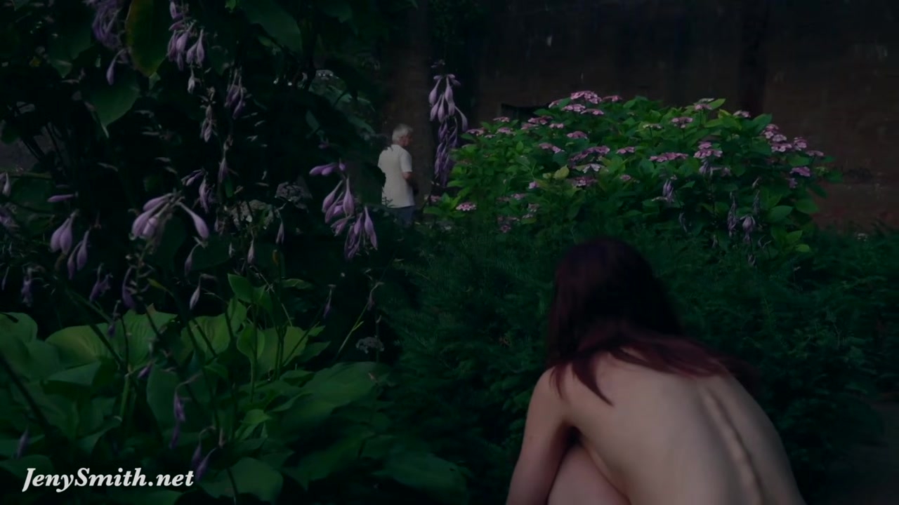 Jeny Smith is walking naked through an abandoned factory.