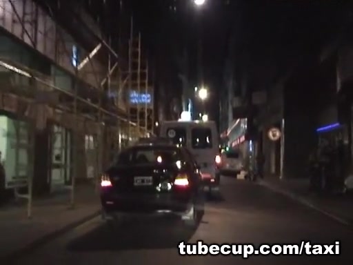 Blonde and brunette lesbian licking in taxi