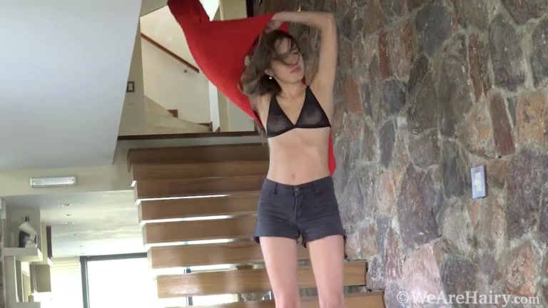 Ambar comes down her stairs to masturbate