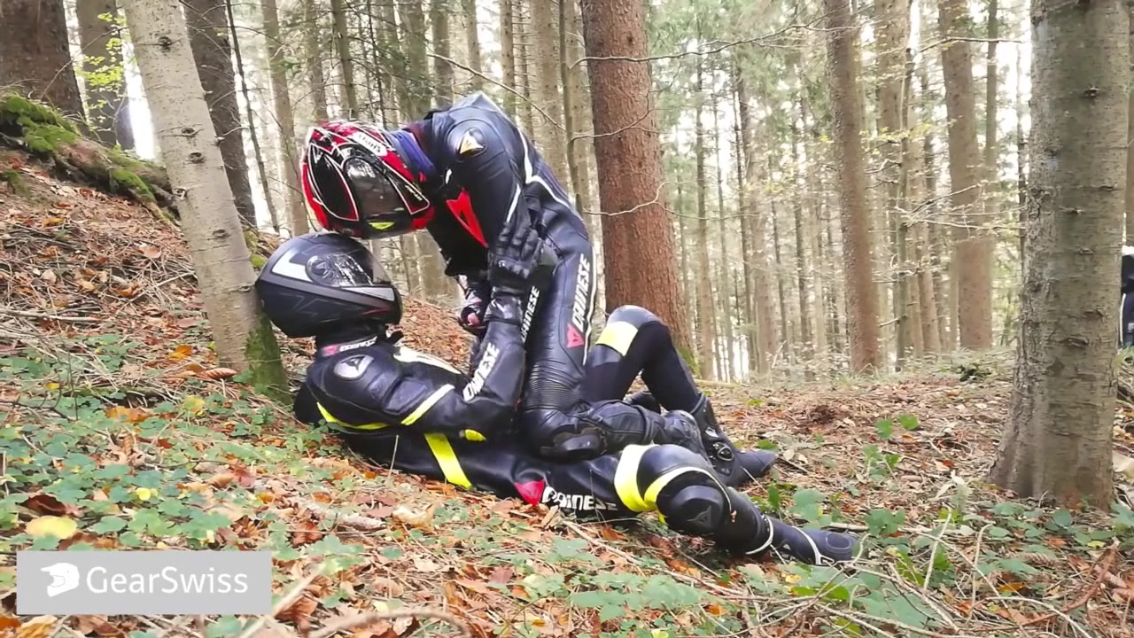German dainese bikers having fun in the wood