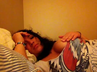 Raunchy babe exposing her juggs on camera and fucks with a dildo