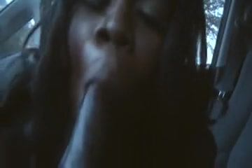 Ebony woman taking a black cock deep in her mouth