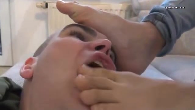 Young alpha feet licking