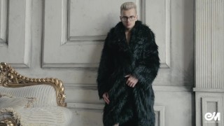 Blond twink boy nude in fur coat shows his long uncut cock
