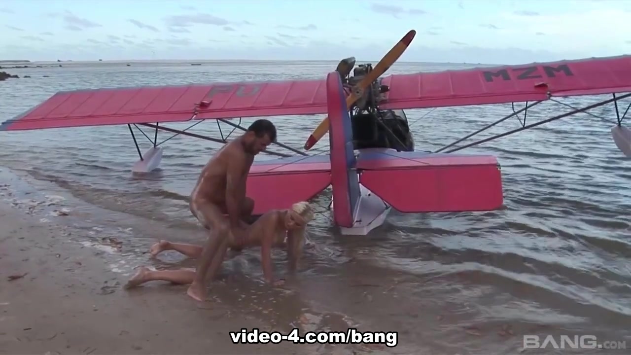 Caylian curtis fucks a pilot on a secluded island beach - BANG