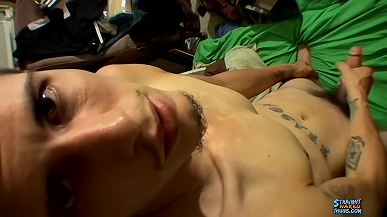 Tattooed twink Bentley pumps his cock with his eyes closed