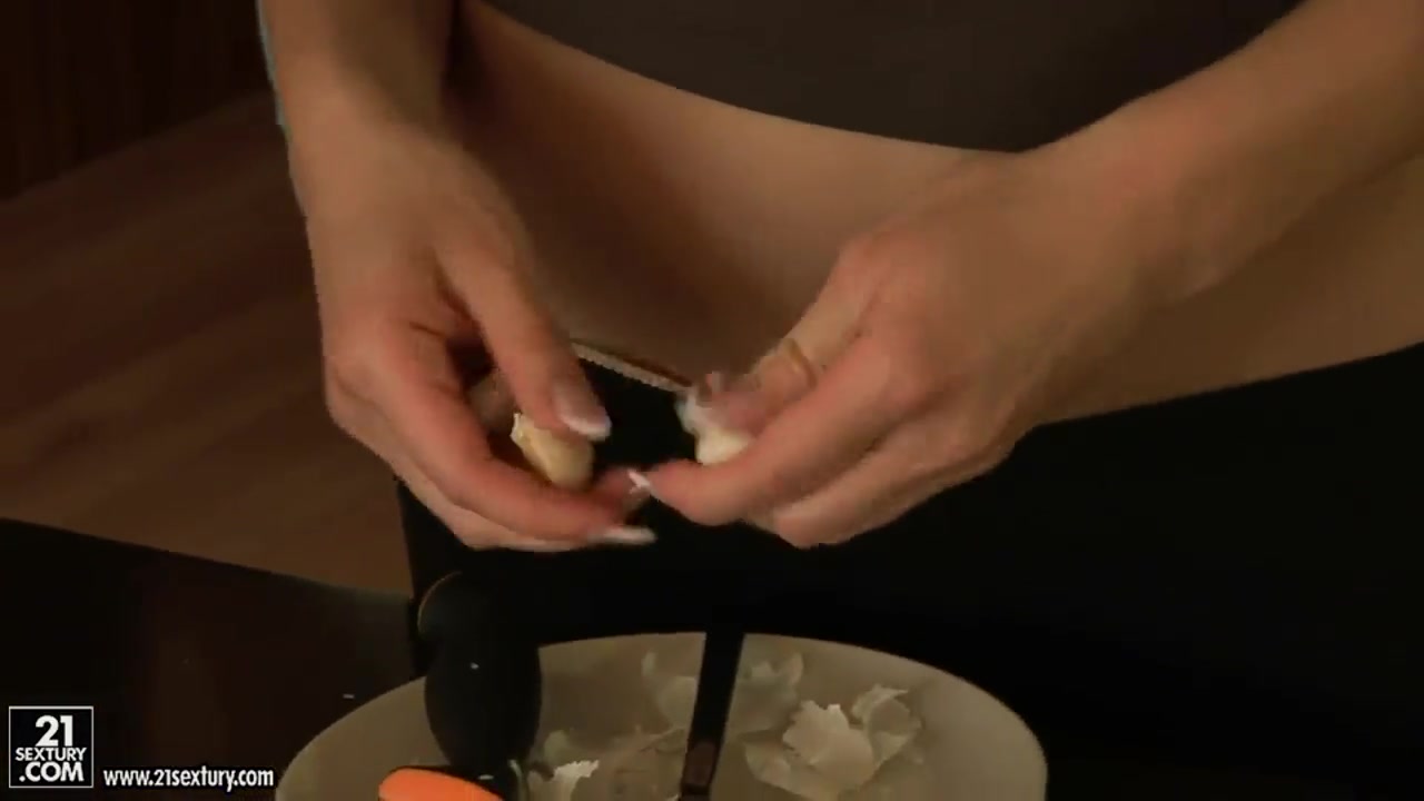Aletta Ocean cooking and demonstrating her boobs