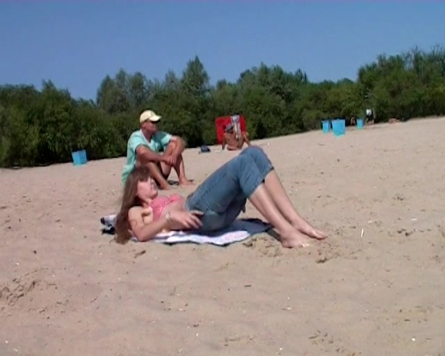 Real beach nudist pussies stretching on the sand
