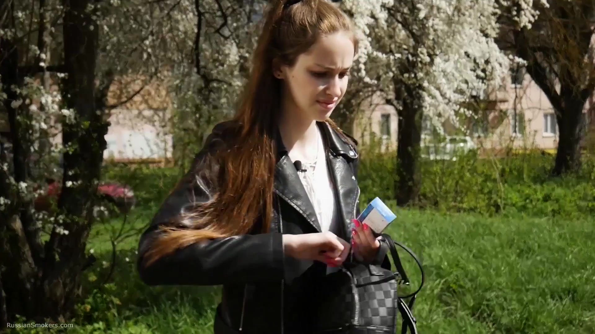 Non Smoker Masha Is Smoking Two All White 120mm Cigarettes Outside