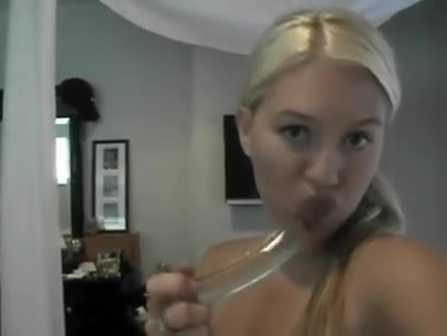 Long glass dildo inside a beautiful horny blonde