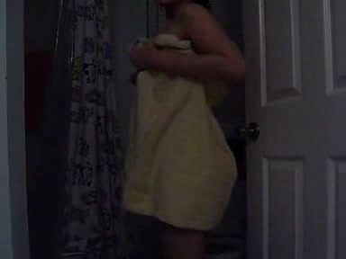 Short-haired brunette dancing and teasing you
