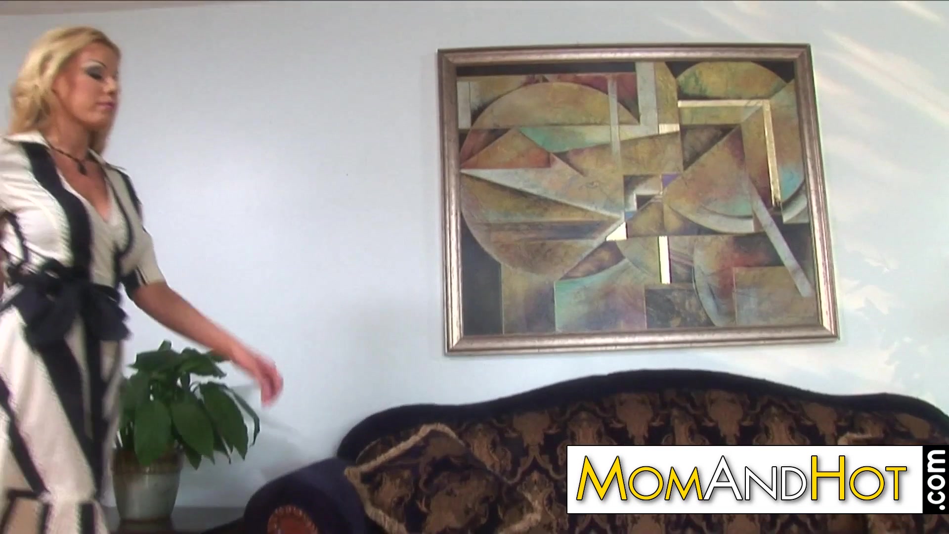 MILF Nicole Sheridan blows younger guy