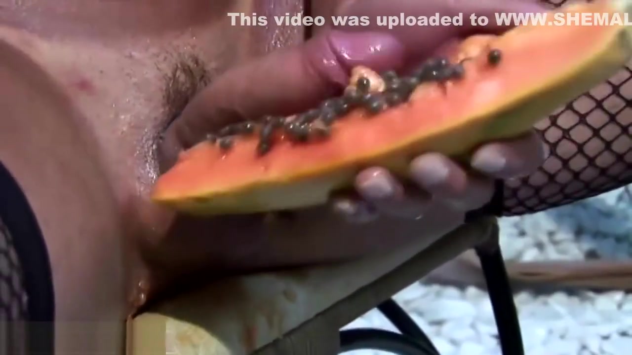 Sticky fruit juice dribbles down this shemales thick shemeat