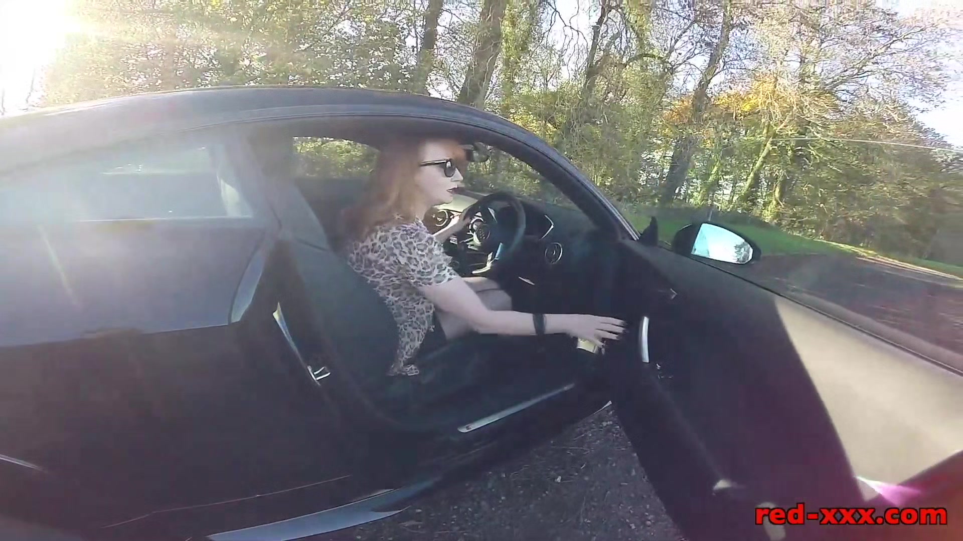 British mature Red fingers her cunt in the car again