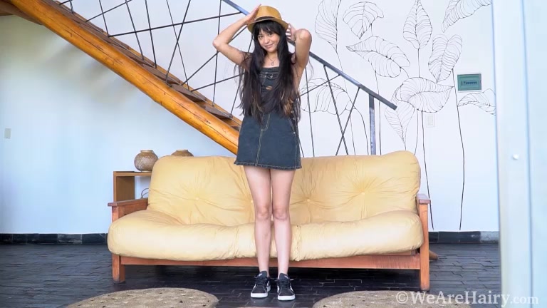 Joaquina masturbates on her yellow chair - WeAreHairy