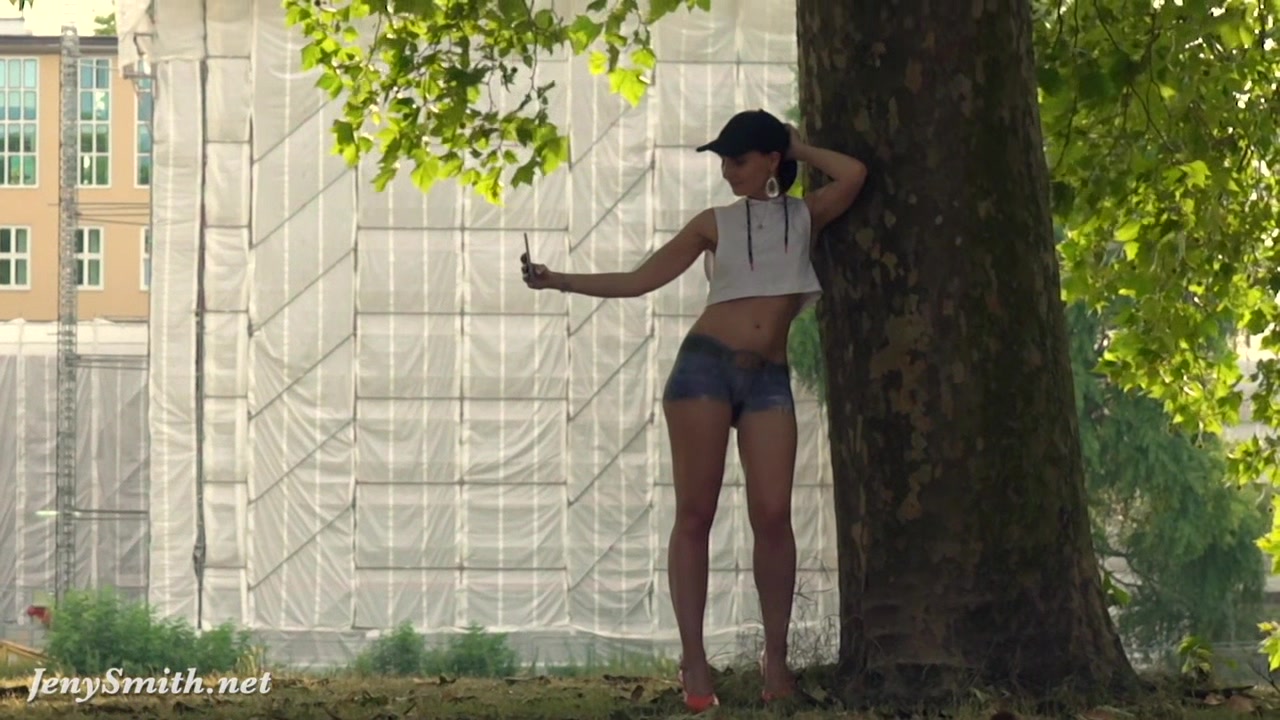 Jeny Smith walks the streets naked with only painted pants