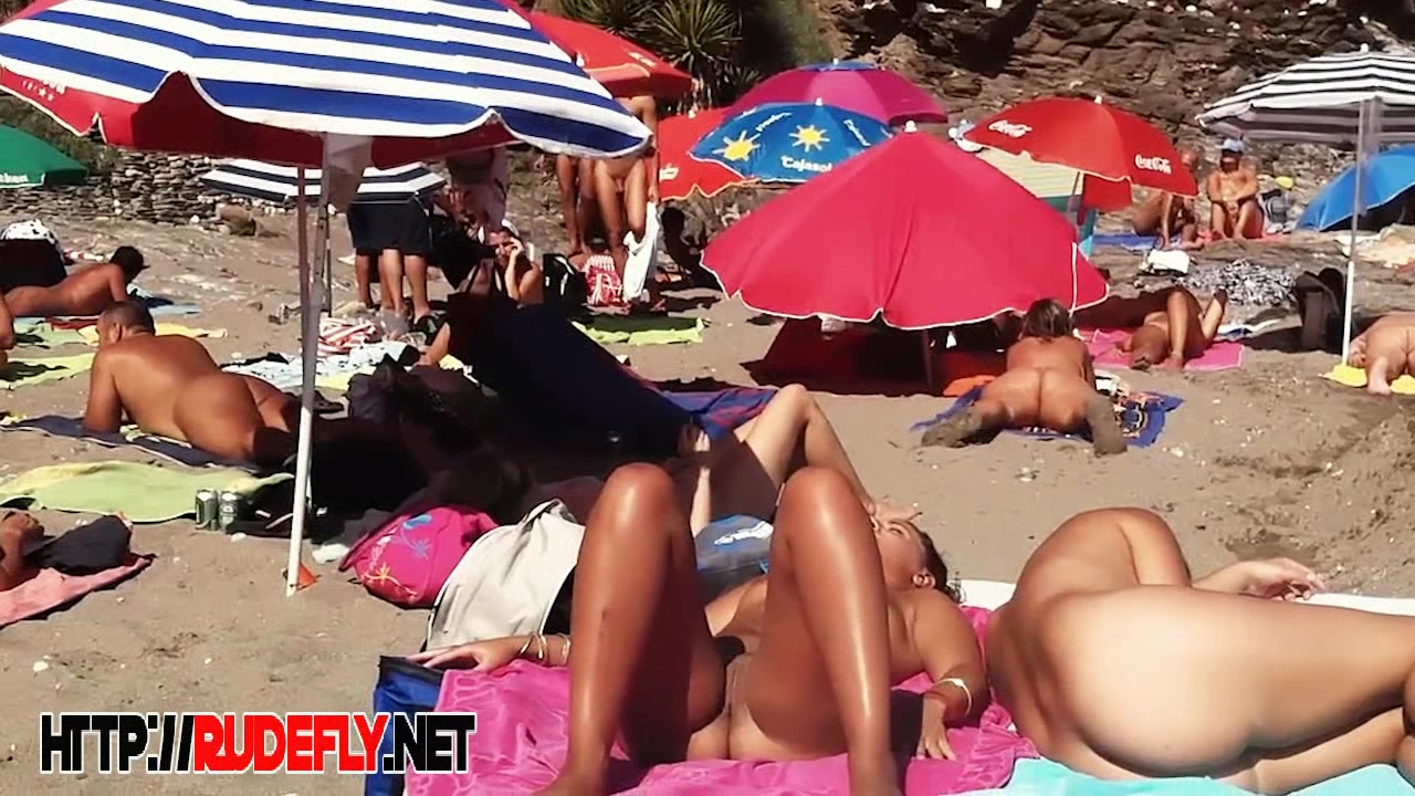 webcam catches amateurs nude and half nude on beach