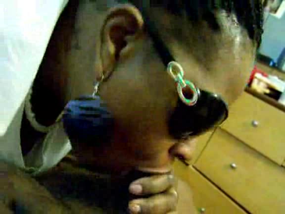 Black slut with sunglasses takes cock deep in her mouth