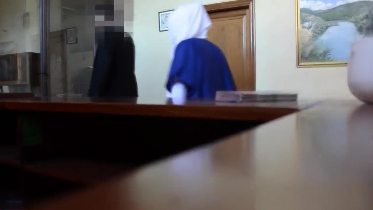 Hijab wearing babe sucking cock and balls