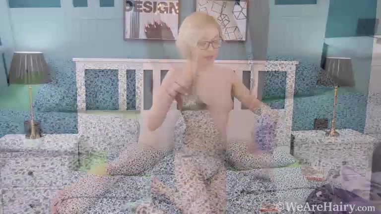 Abby masturbates with her favorite toy in bed - WeAreHairy