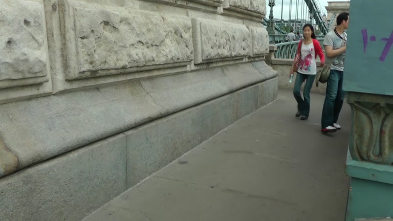 Young babe shows her tits in a public streets