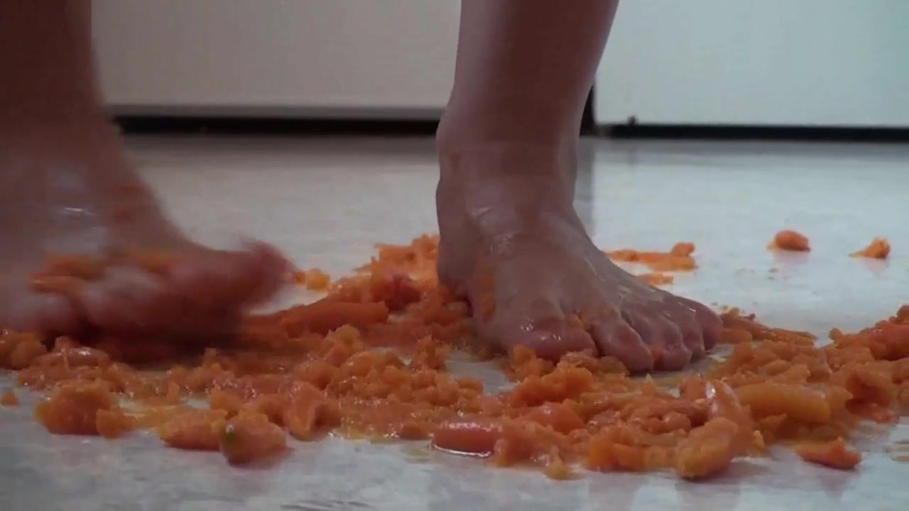Close up of trampling food in the kitchen by Foot Girls