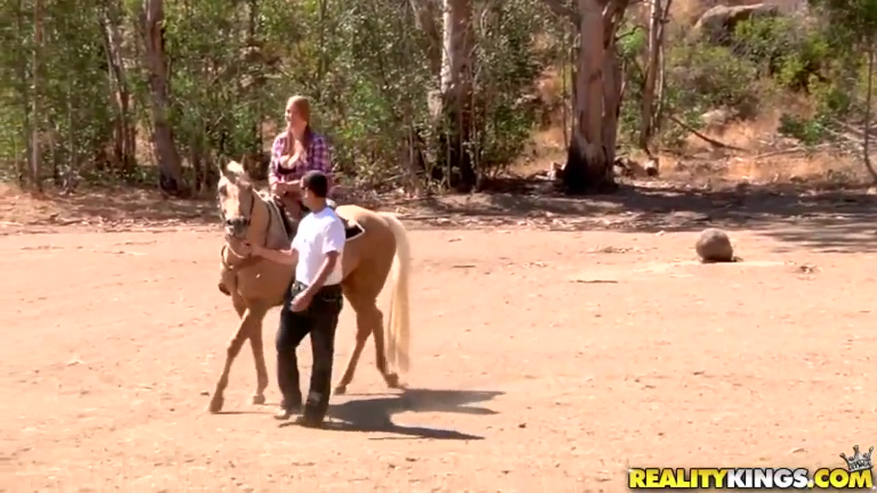 Ridiculously busty Sierra Skye rides the horse