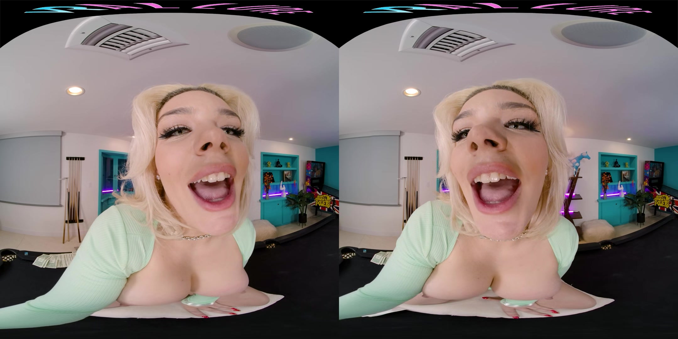 Seductive blonde with big boobs gives you a steamy show in VR