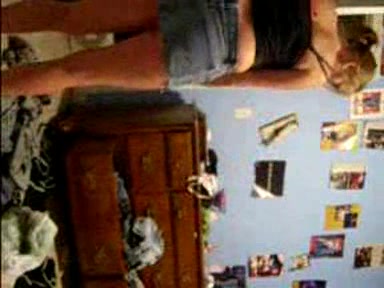 Blonde young girl taking her clothes off slowly