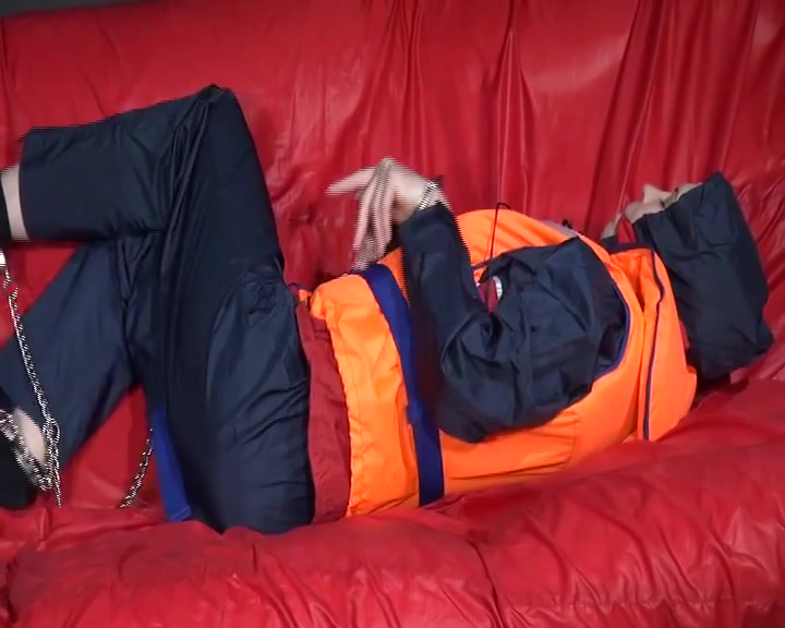 Get 3 Archive Videos With Nice Young Women Enjoying Bondage In Shiny Nylon Rainwear From 2008.