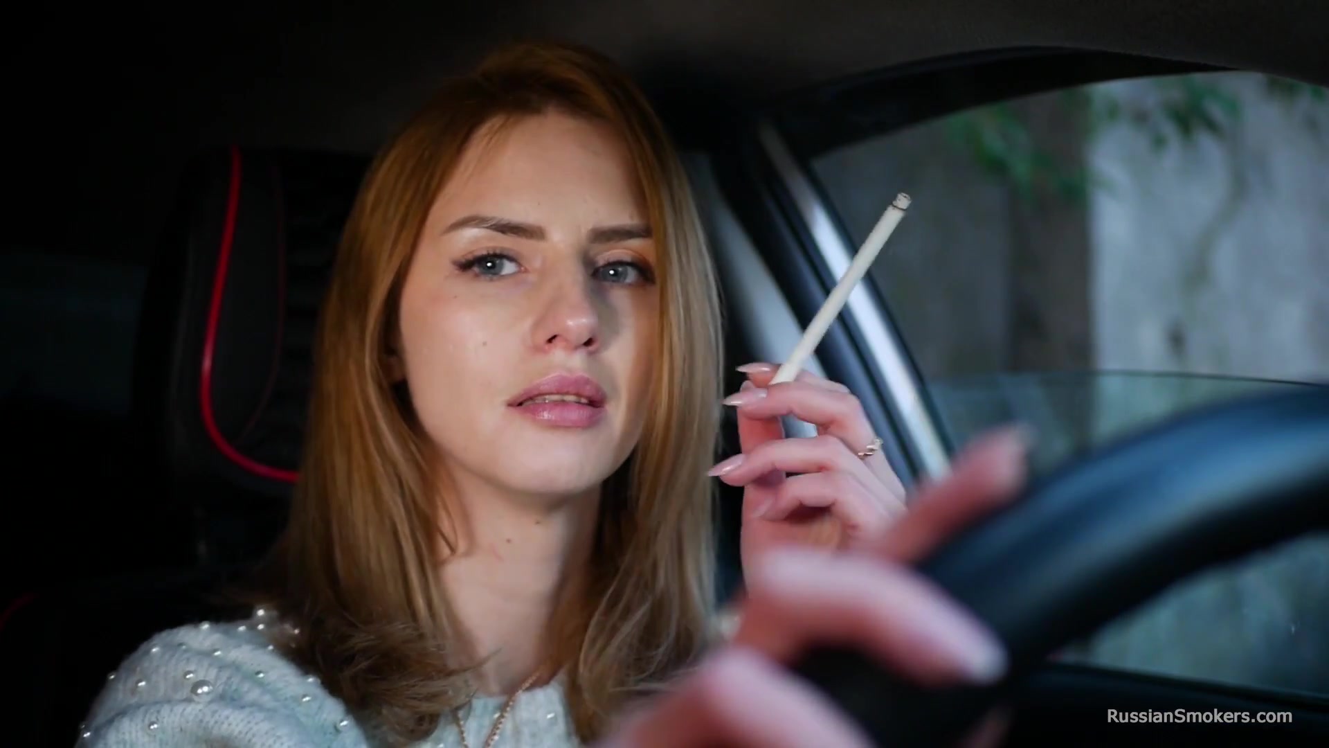 Meet Anastasia In Her Car While She Is Smoking Two 120mm All White Cigarettes