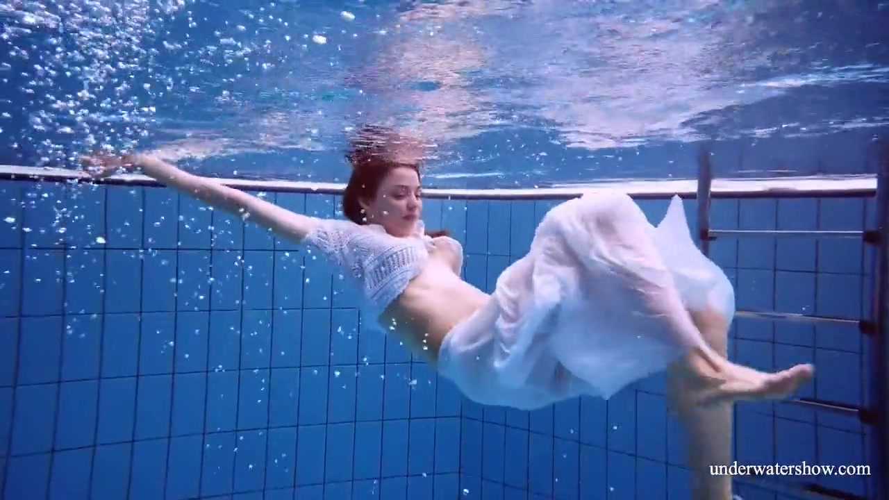 Redhead Marketa In A White Dress In The Pool