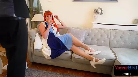 Redhead domina MILF in sexy lingerie teases male wanker