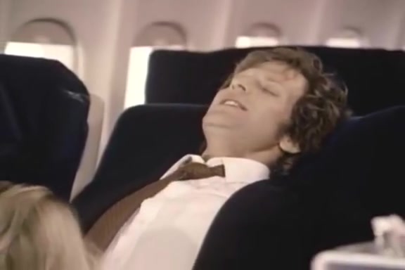 Stacey Donovan, Paul Thomas in retro porn clip featuring sex with a stewardess