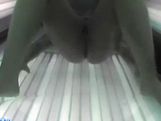 Sexy chick exposes her appetizing muff and her sexy bra buddies to the camera in solarium