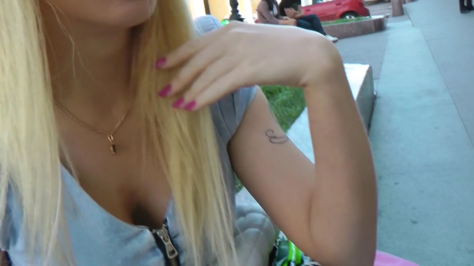 Lusty blonde does anal fisting in public