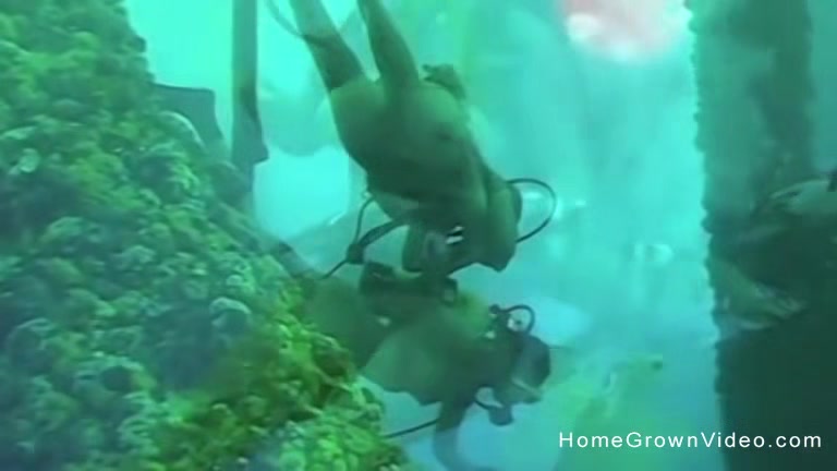 Fucking this busty cutie underwater while scuba diving