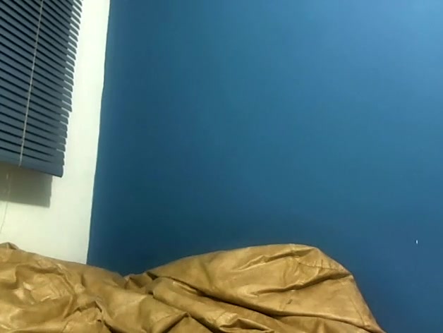 Pig-tailed adorable gal sucking a lollipop and showing her cleavage