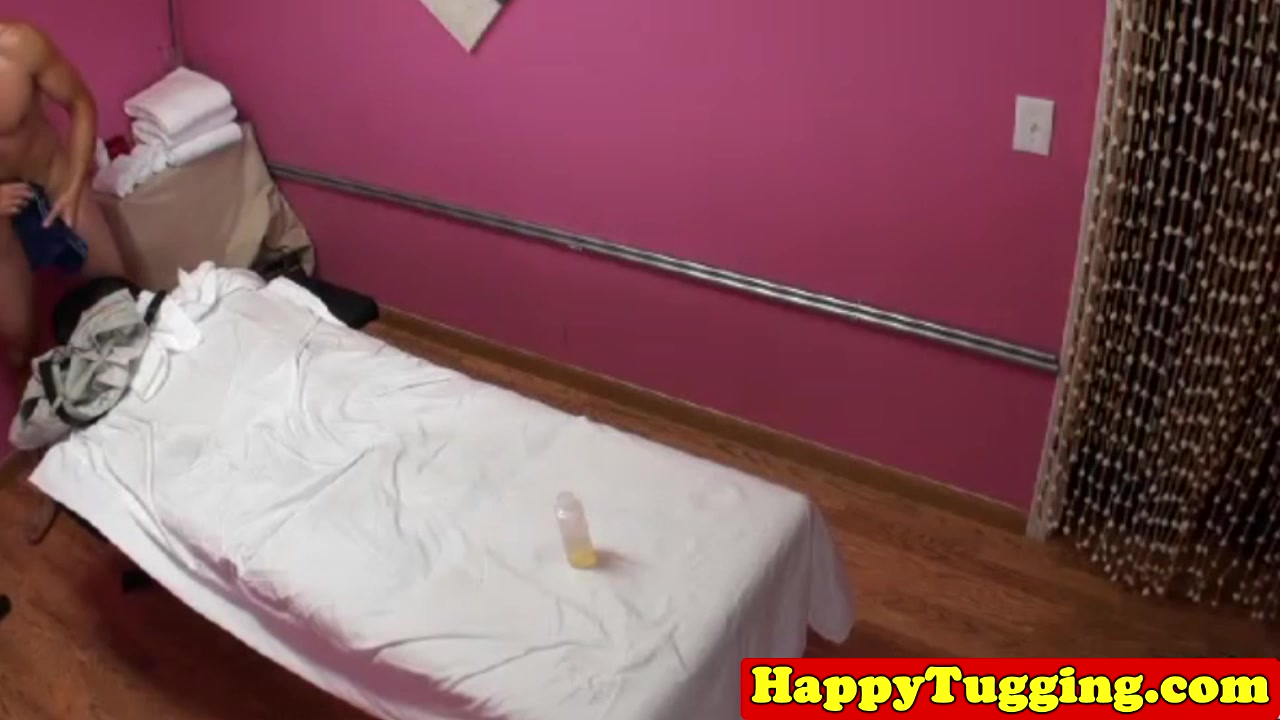 Jerking asian masseuse tugging client